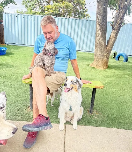 pet care specialist with dogs